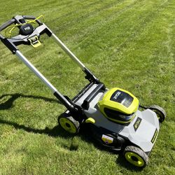 Ryobi dual battery mower  1 year old 