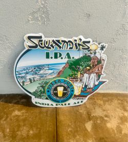 Pizza Port Swami’s IPA metal bar sign.
