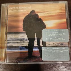 
This CD features the beloved vocalist Barbra Streisand with her album "Love like Ours". It was released in 1999 under the record labels Sony and Sny.