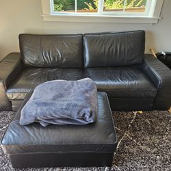 IKEA Black Leather Couch And Ottoman 