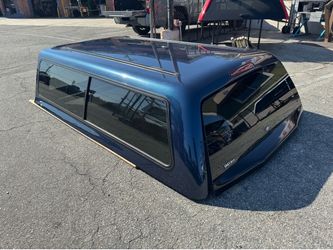 Ford F-350 camper shell long bed . Snugtop