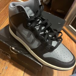 The shoe in the image is the Nike Dunk High Retro Premium "50 Years of Hip Hop"