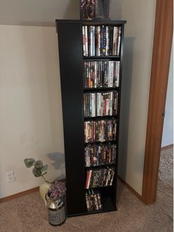 DVD spinning tower/organizer