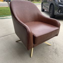 Brown Faux Leather Swivel Armchair
