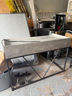 Desk with electrical outlet
