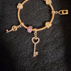 Gold Tone Charm Bracelet