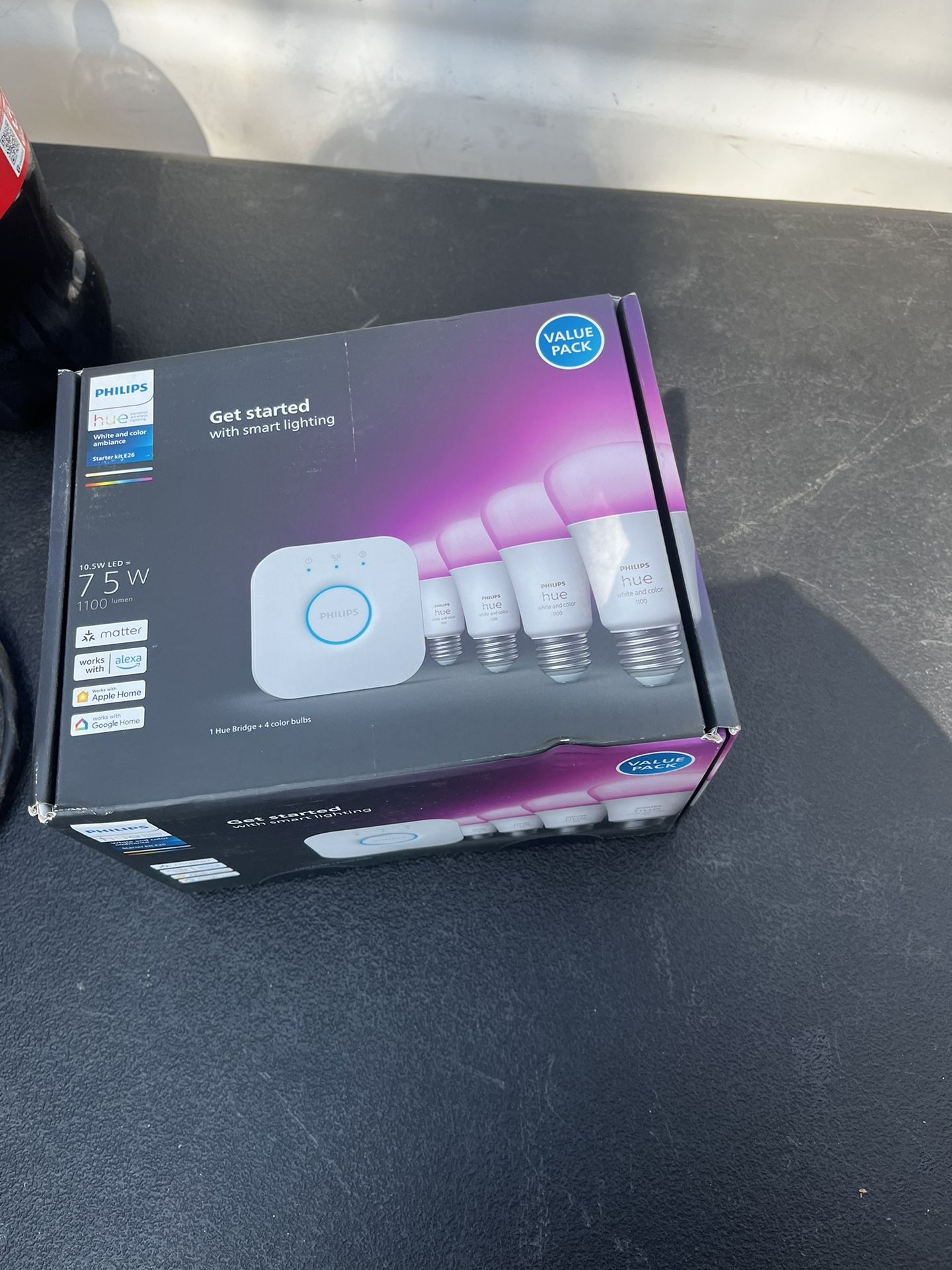Philips Hue 75-Watt Equivalent A19 Smart LED Color Changing Light Bulb Starter Kit (4 Bulbs and Bridge)