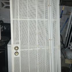 Security. Doors.  301/2.     And 32.  Inches. 79. And 76.  Tall