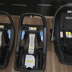 Graco Infant Car Seat  Snugride Snugfut 35 DLX with extra base