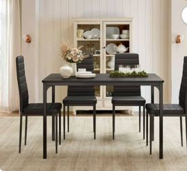 All black dining table set for 4