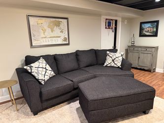 Gray sectional with matching ottoman