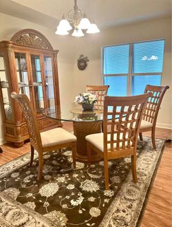 Glass Table And 4 Chairs And Curio ( Deliver Available)