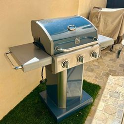 Kenmore 3 burner grill, only a year old, good condition, normal wear, igniters work, cover included, tank included