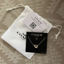 Coach gold necklace 