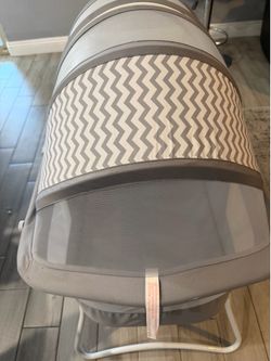 Gray baby crib .