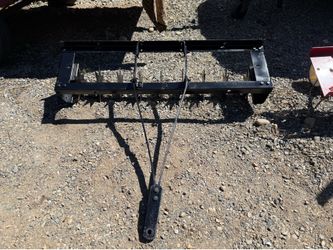 Lawn tractor aerator
