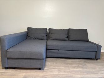Sectional gray couch with storage convertible