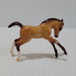 Breyer Stablemate G2 Scrambling Foal dun from Sport Horse and Foal set 2007-08.

