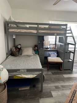 Bunk bed with attached desk