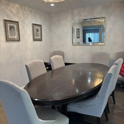 Gently Used Dinning Room Table With 8 Slip Cover Chairs