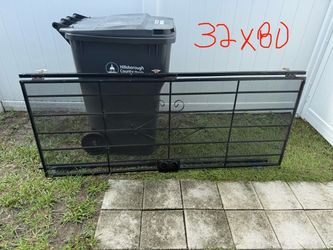 32 in. x 80 in. $40 Black Surface Mount Steel Security Door with Expanded Metal Screen. 32x80 with a little rust at the bottom