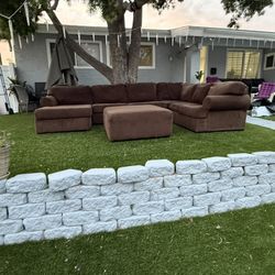 Super large U-shaped sofa with ottoman, coffee color.
