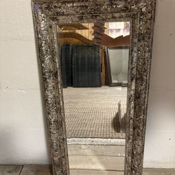 Ornate vintage silver mirror