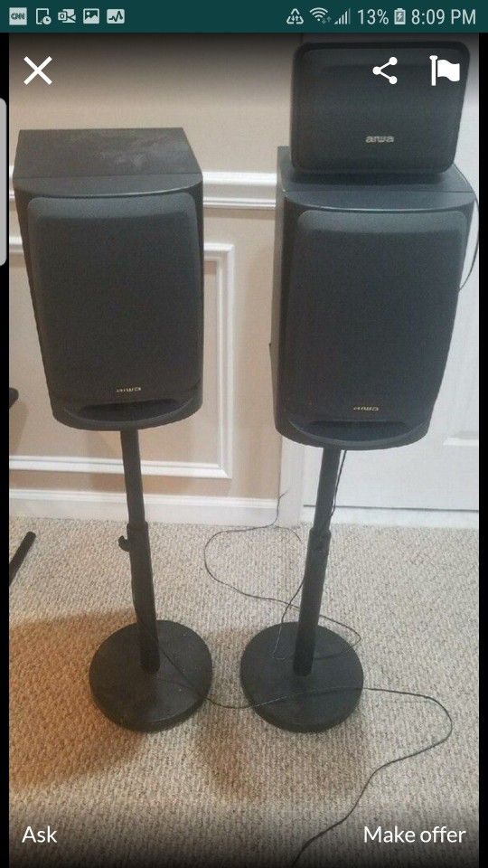 4 Speakers with 2 speaker stands