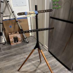 TV Stand with Artistic Easel Design – $40