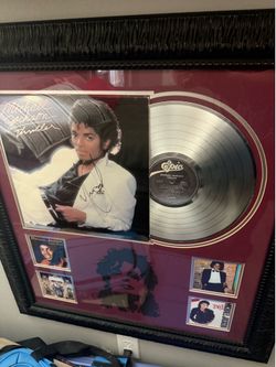 Michael Jackson signed and framed Thriller Album.