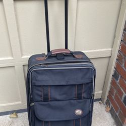 American Tourister Rolling Suitcase – Carry-On/Medium