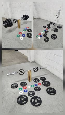 Olympic Multi-Grip Barbell and Weight Plate Set (100 pounds). Delivery for extra. Miami 33130

Versatile Olympic weightlifting set includes a chrome-p