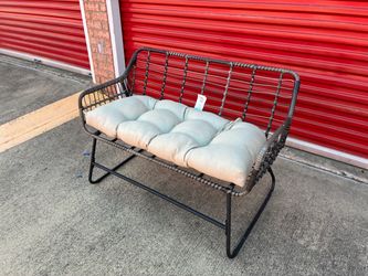 Patio wicker bench with cushion
