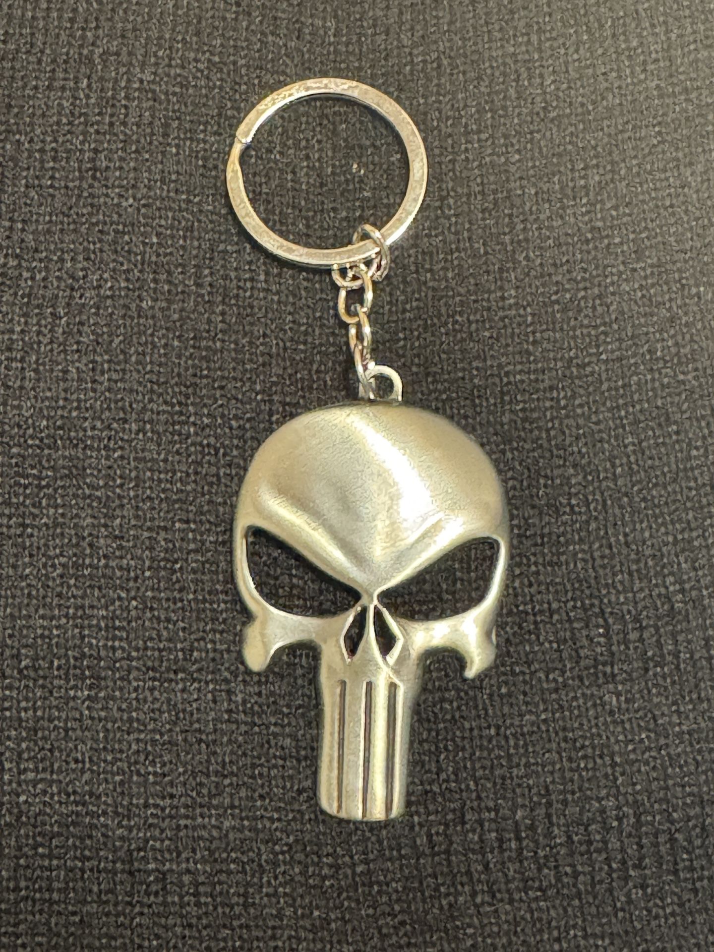 Marcel Punisher Silver Keychain. New