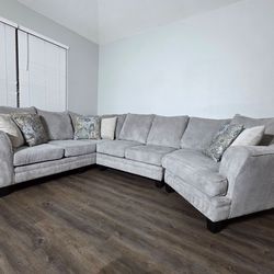 Gray cuddler sectional
