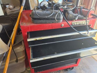 Medal shop cabinet 24 in ling.  32 in high.  19in deep.  Dusty, draws work good.