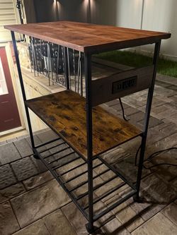 Bar table with electrical connection