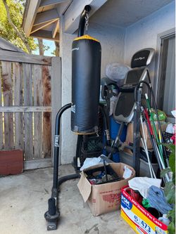 EVERLAST punching bag with stand.