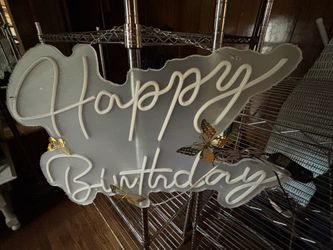 Neon lighting Happy Birthday sign