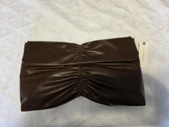 Brown leather clutch bag