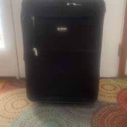 Large Delsey Rolling Luggage $20