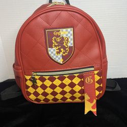 Harry Potter Hogwarts Gryffindor Small Size Backpack. 10.5X8.5". https://offerup.com/redirect/?o=RGJsLlppcA== Close