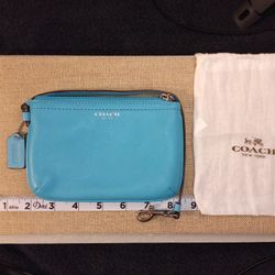 Coach Leather Wristlet – Turquoise Blue (Never Used)
 Turquoise Blue with Dust Bag