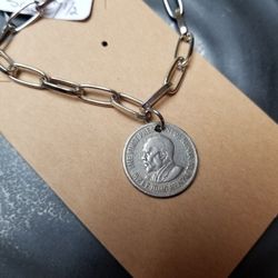 Handcrafted design of a Coin Bracelet. Unisex style