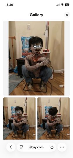 Zombie Boy Eating Limb animatronic