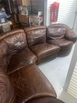 Italian leather sectional sofa w/ swivel ends