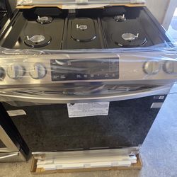 Brand new Samsung slide inn gas range stainless steel warranty  1 year Financing With Snap If You Qualify