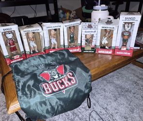 Milwaukee Bucks Bobbleheads and bag