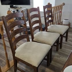 3 solid wood upholstered chairs