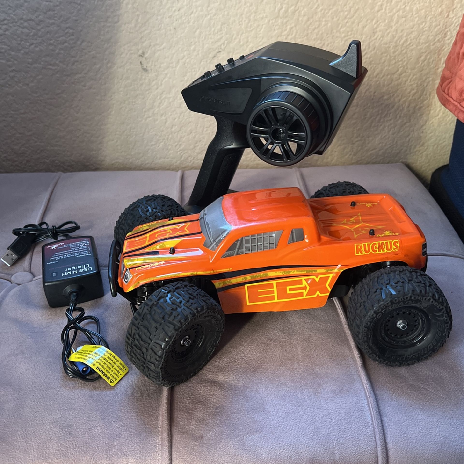 ECX Ruckus 4WD Monster Truck RTR Orange Yellow Toys